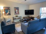 Kick Your Feet Up in the Living Room and Sink Into the Couch After a Fun Filled Day by the Lake